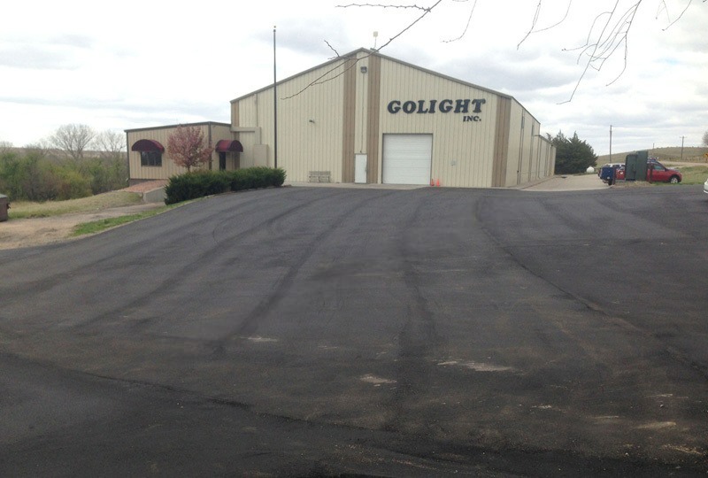 Freshly sealcoated commercial parking lot